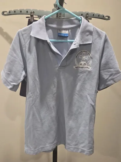 Immaculate Heart College - Sky blue polo size 8